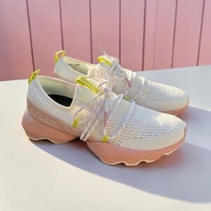 Sorel Women's White Slip-On Sneakers with Pink Sole and Yellow Accents